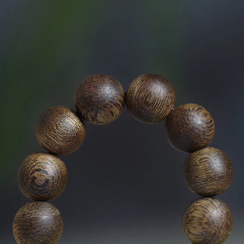 108 Mala Beads Agarwood Bracelet for Balance & Strength - Image 13