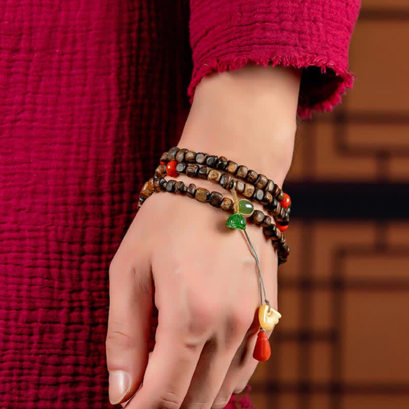 108 Mala Beads Agarwood Bracelet for Peace & Strength - Image 11