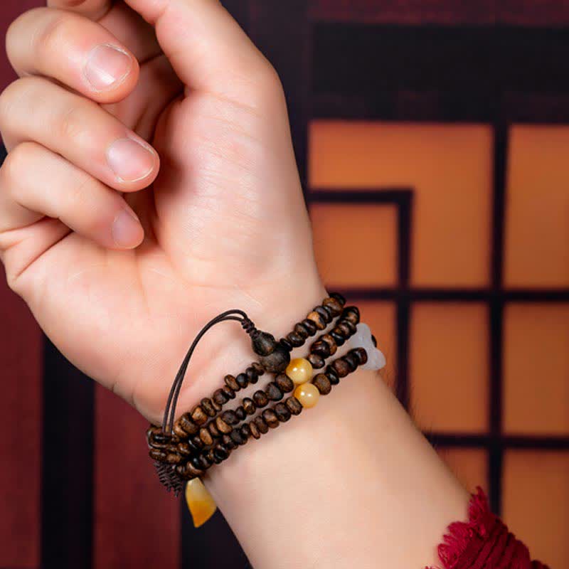108 Mala Beads Agarwood Bracelet for Peace & Strength - Image 13