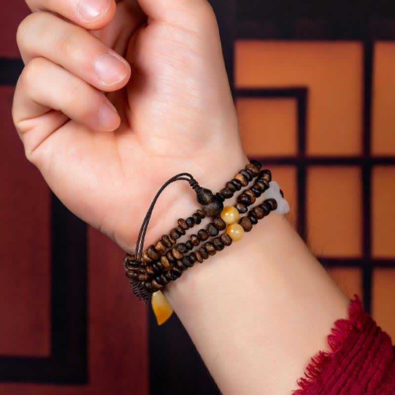 108 Mala Beads Agarwood Bracelet for Peace & Strength - Image 17