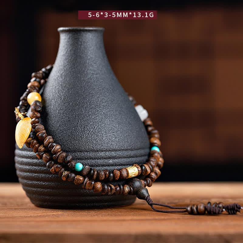 108 Mala Beads Agarwood Bracelet for Peace & Strength - Image 2