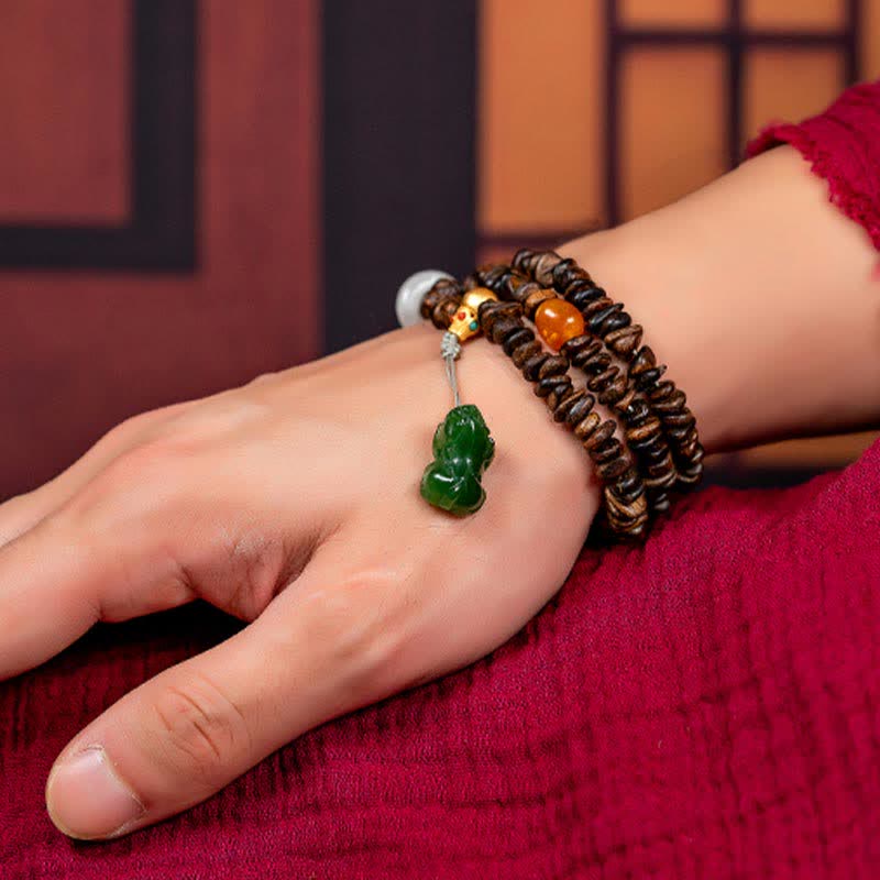 108 Mala Beads Agarwood Bracelet for Peace & Strength - Image 22