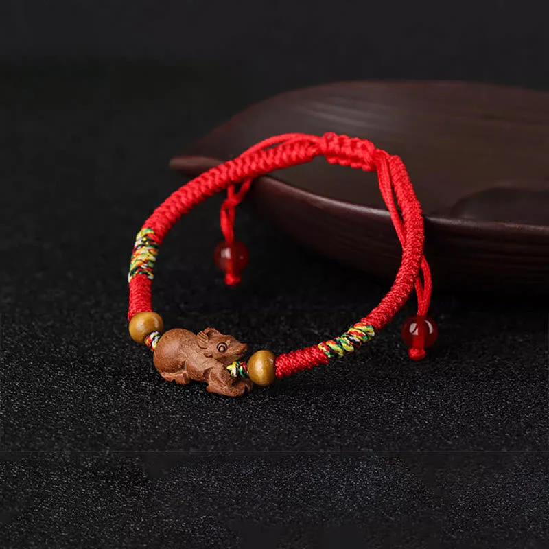 Chinese Zodiac Luck Bracelet with Red String and Peach Wood - Image 10