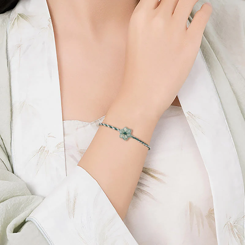 Green Jade Orchid Prosperity Bracelet with Braided String - Image 8
