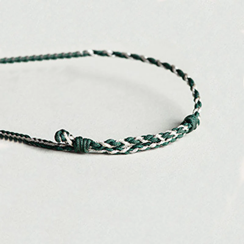 Green Jade Orchid Prosperity Bracelet with Braided String - Image 9