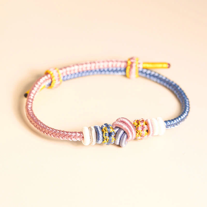 Handcrafted Two-Color Peace Knot Red String Bracelet - Image 5