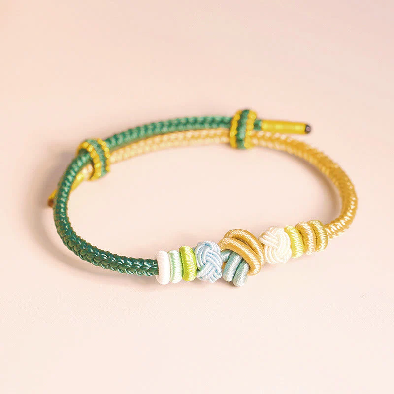 Handcrafted Two-Color Peace Knot Red String Bracelet - Image 8