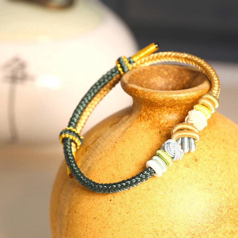 Handcrafted Two-Color Peace Knot Red String Bracelet - Image 9