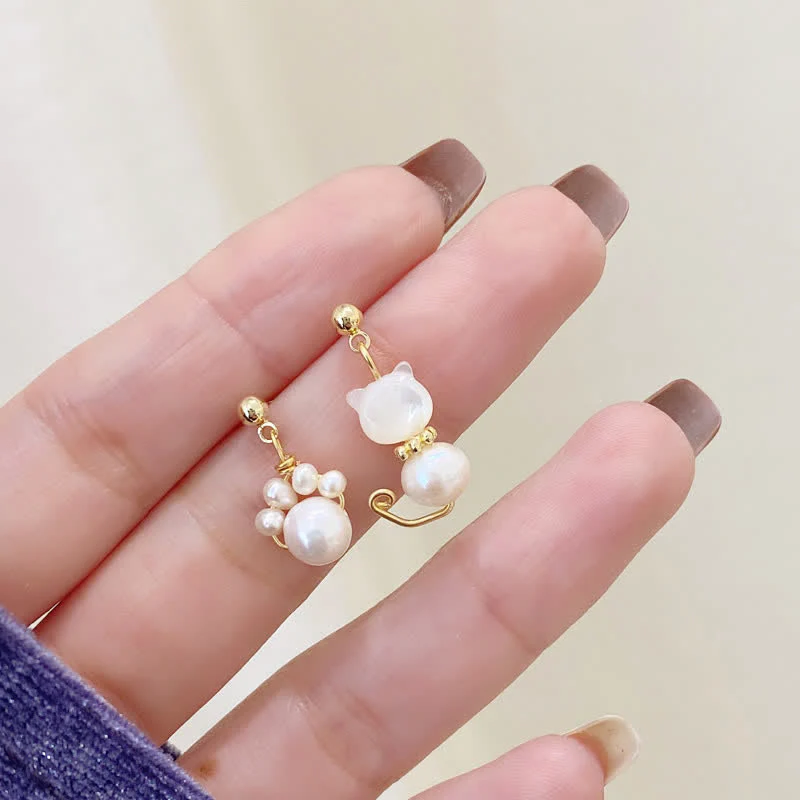 Pearl Wisdom Stud Earrings with Cat Paw Design - Image 2