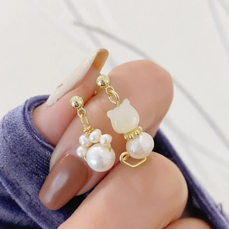 Pearl Wisdom Stud Earrings with Cat Paw Design - Image 5