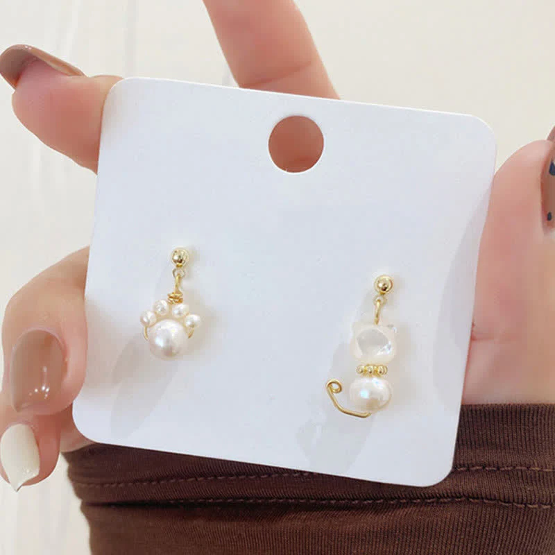 Pearl Wisdom Stud Earrings with Cat Paw Design - Image 6