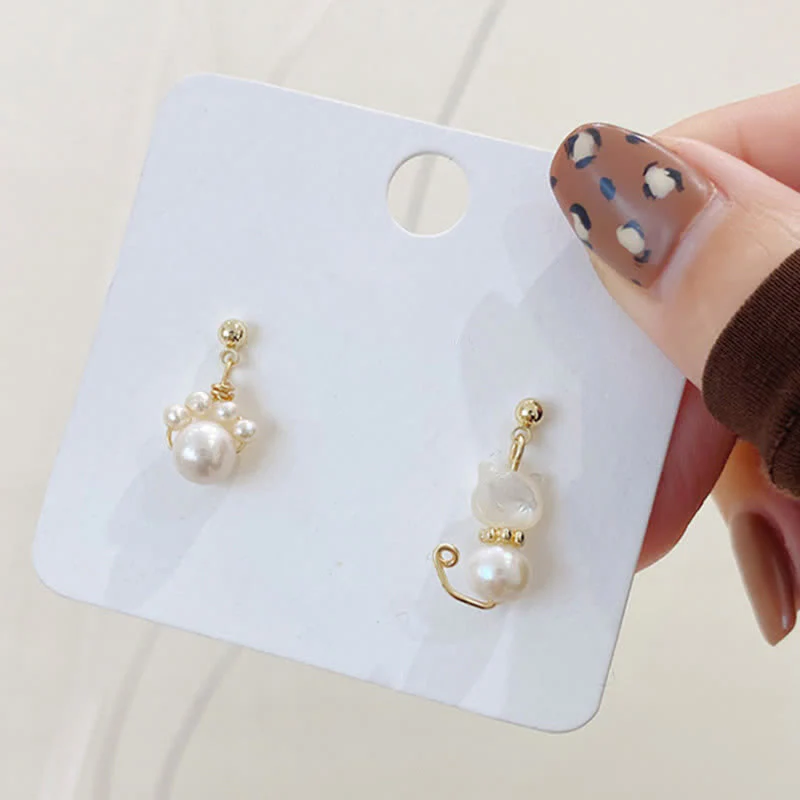 Pearl Wisdom Stud Earrings with Cat Paw Design - Image 7