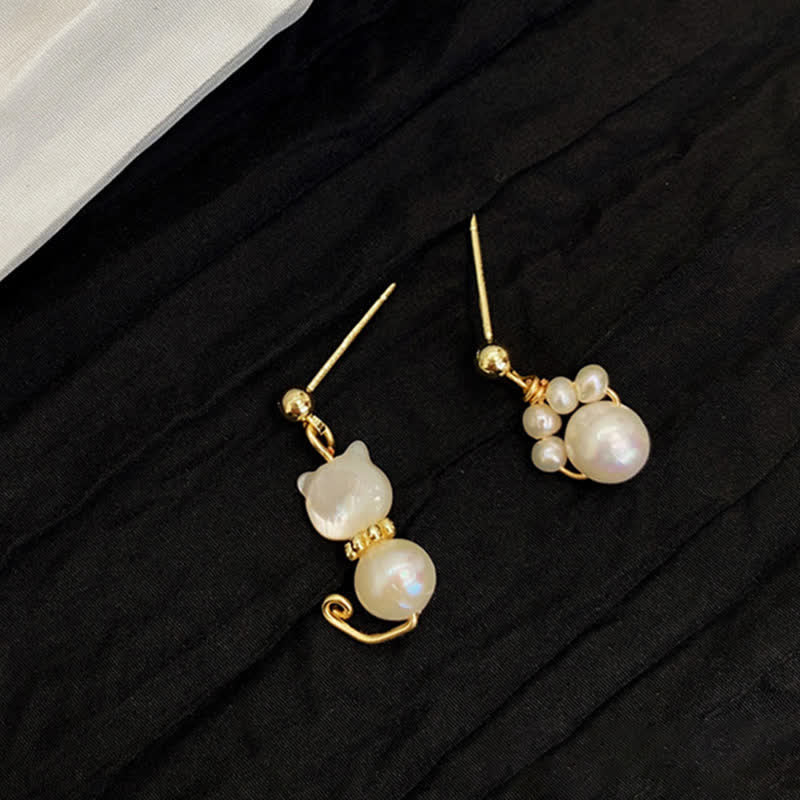 Pearl Wisdom Stud Earrings with Cat Paw Design - Image 9
