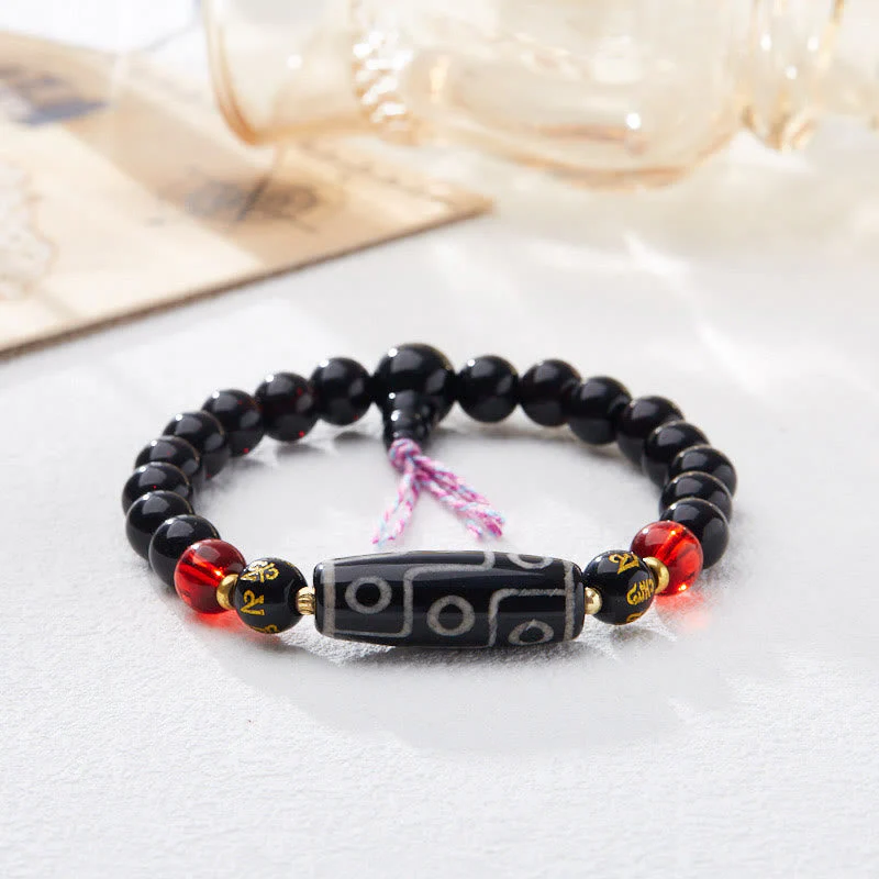Nine-Eye Dzi Bead Black Onyx 8mm Spiritual Protection Bracelet - Image 4