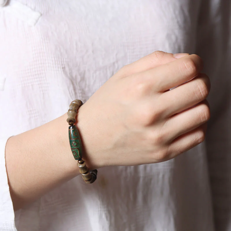 Nine-Eye Dzi Bead Green Sandalwood Spiritual Bracelet 14-16cm - Image 5