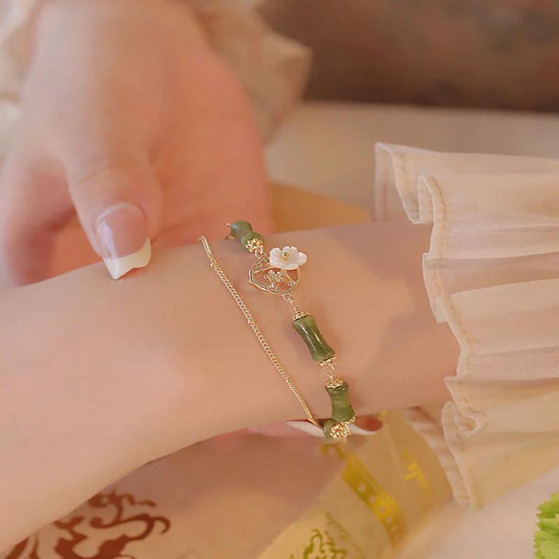 14k Gold Plated Peridot Spiritual Bracelet with Bamboo Flower - Image 8