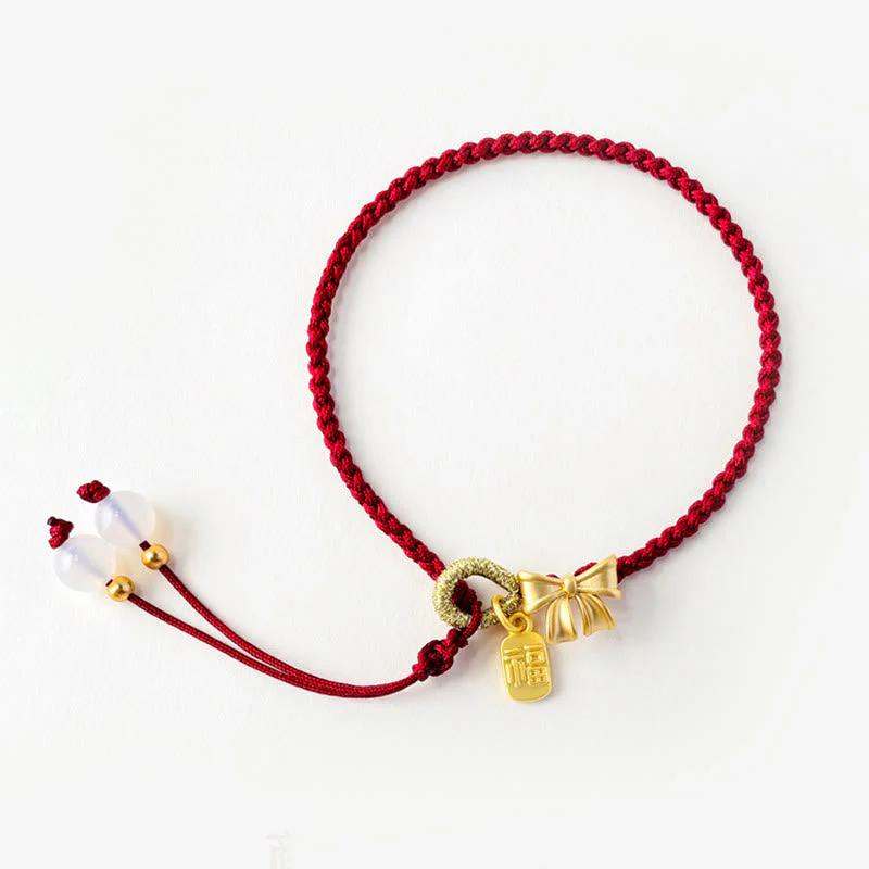 Red String Bracelet with Fu Character Charm and Peach Blossom Detail - Image 6
