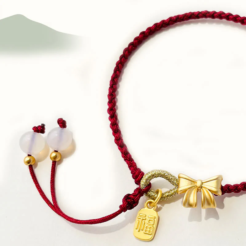 Red String Bracelet with Fu Character Charm and Peach Blossom Detail - Image 7