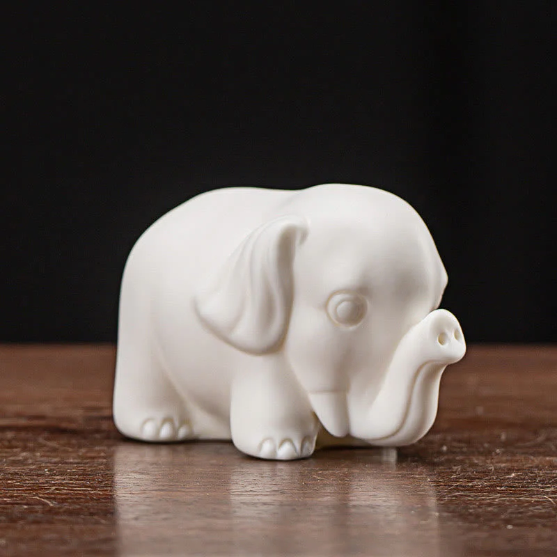 White Porcelain Elephant Figurine Spiritual Strength Decor - Image 2